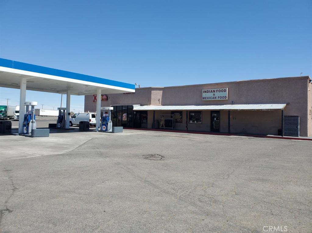 0 Autumn Leaf Road Newberry Springs, CA 92365 - Photo 10 of 10 a living room with furniture and a fireplace