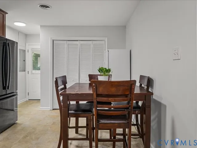 a view of a dining room with furniture