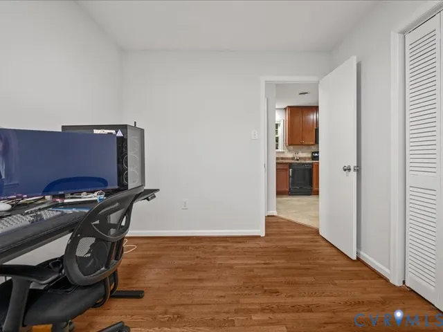 a view of workspace with wooden floor