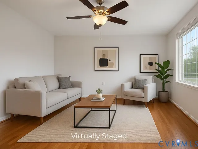 a living room with furniture and a rug