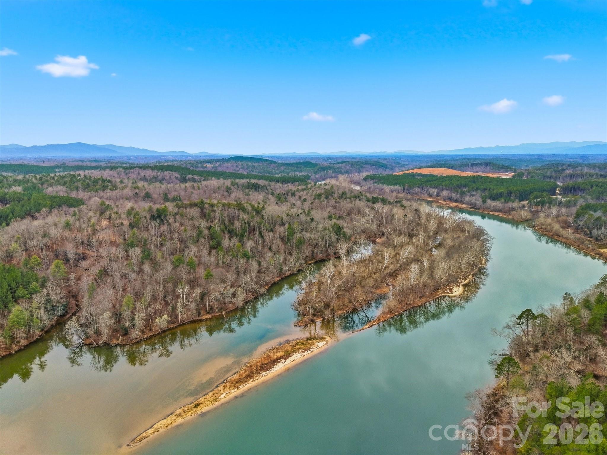 1486 Huffman Bridge Road Morganton, NC 28655 - Photo 6 of 19 a view of a lake with a city