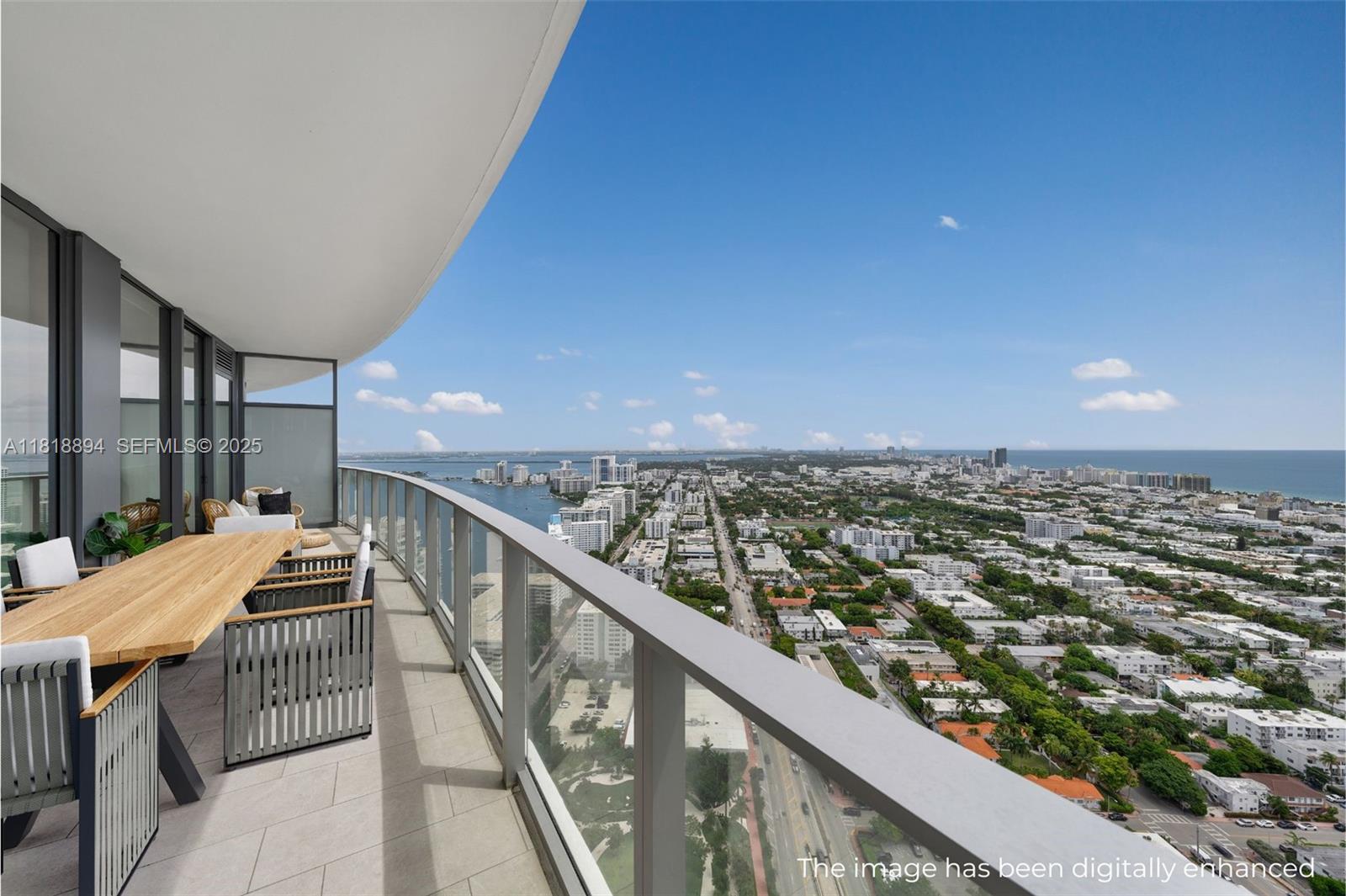 500 Alton Road, Unit 4004 Miami Beach, FL 33139 - Photo 13 of 26 a view of balcony with furniture