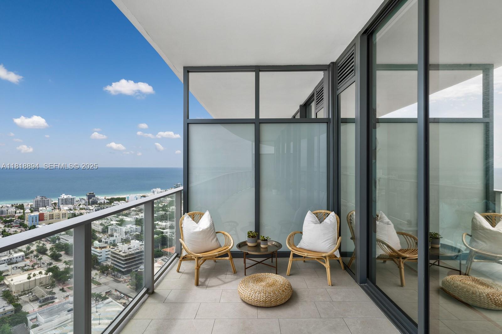 500 Alton Road, Unit 4004 Miami Beach, FL 33139 - Photo 17 of 26 a living room with furniture