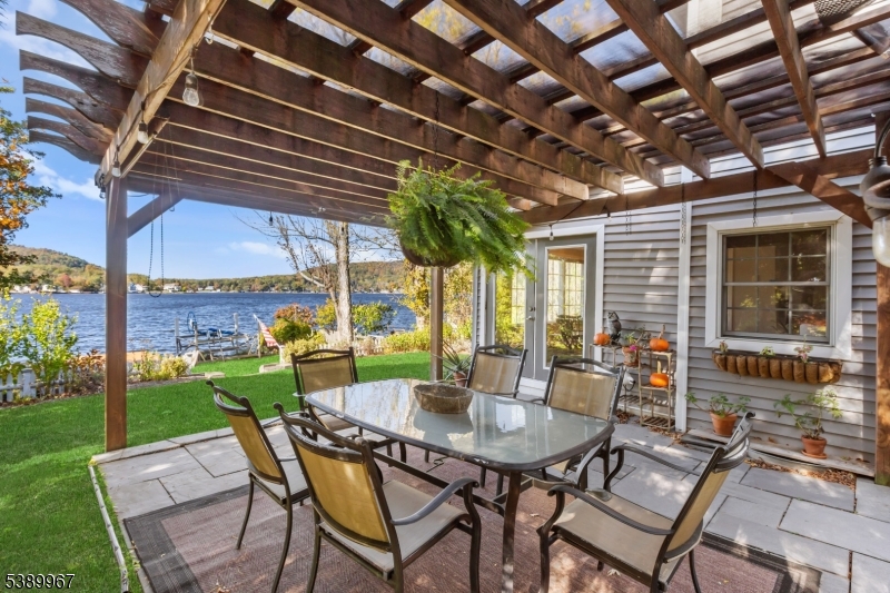 a view of yard with patio