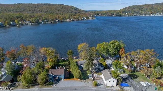 a picture of a book and a white bed
