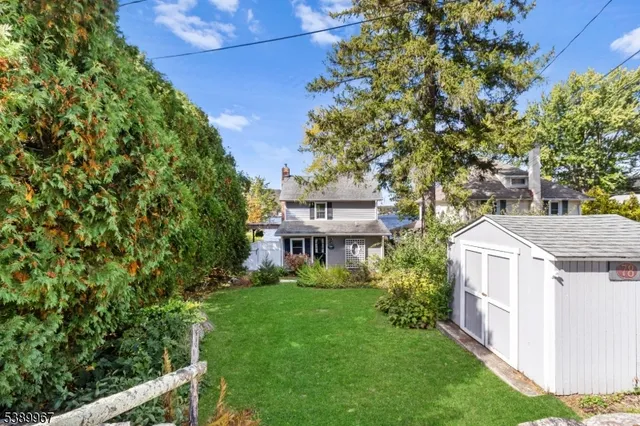 a house view with a garden space