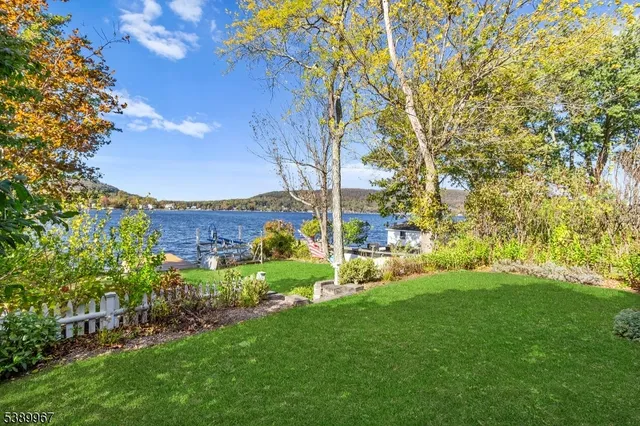 a view of a garden with a building