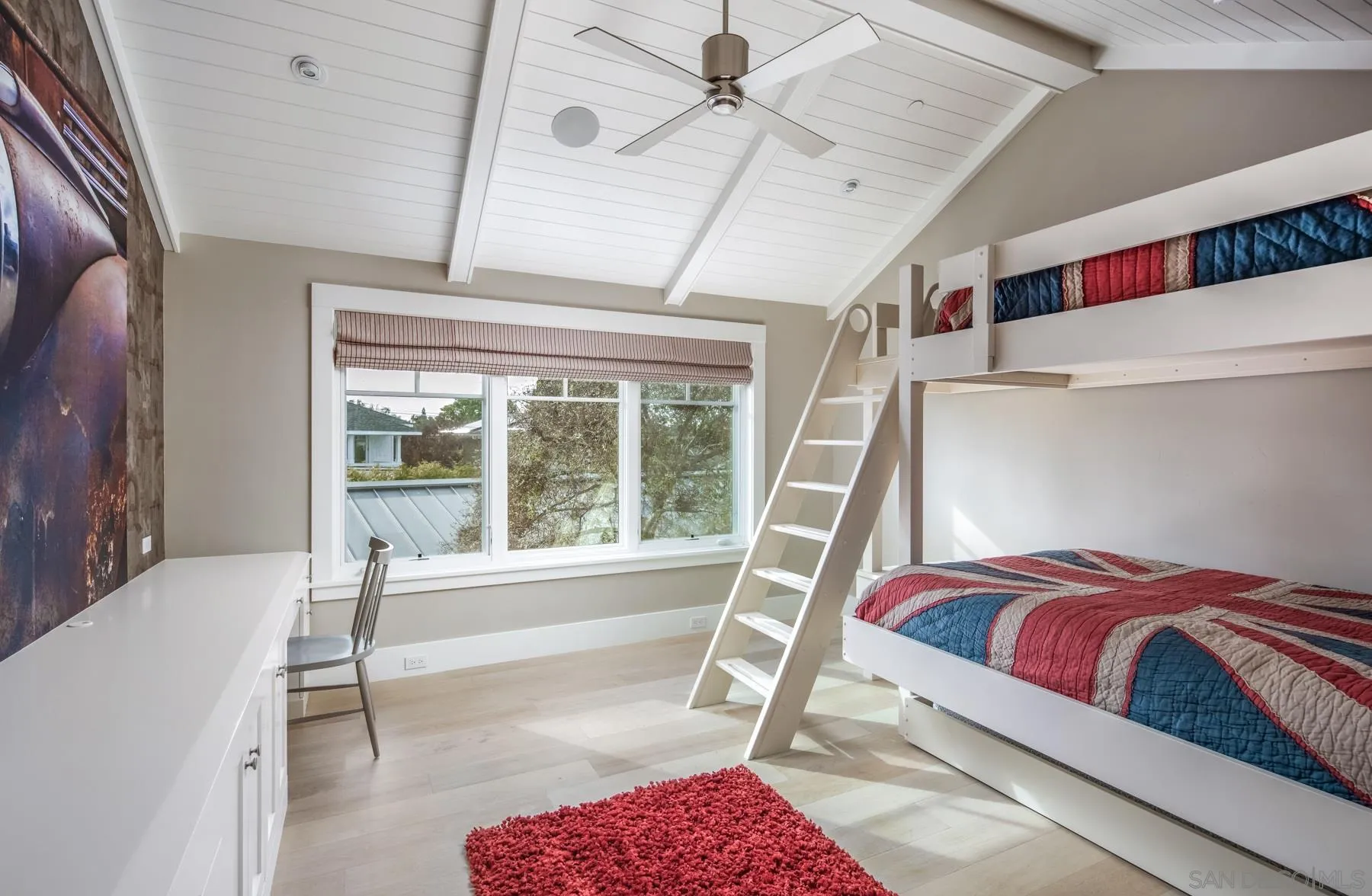 900 Alameda Boulevard Coronado, CA 92118 - Photo 16 of 30 a bedroom with a bed and a window