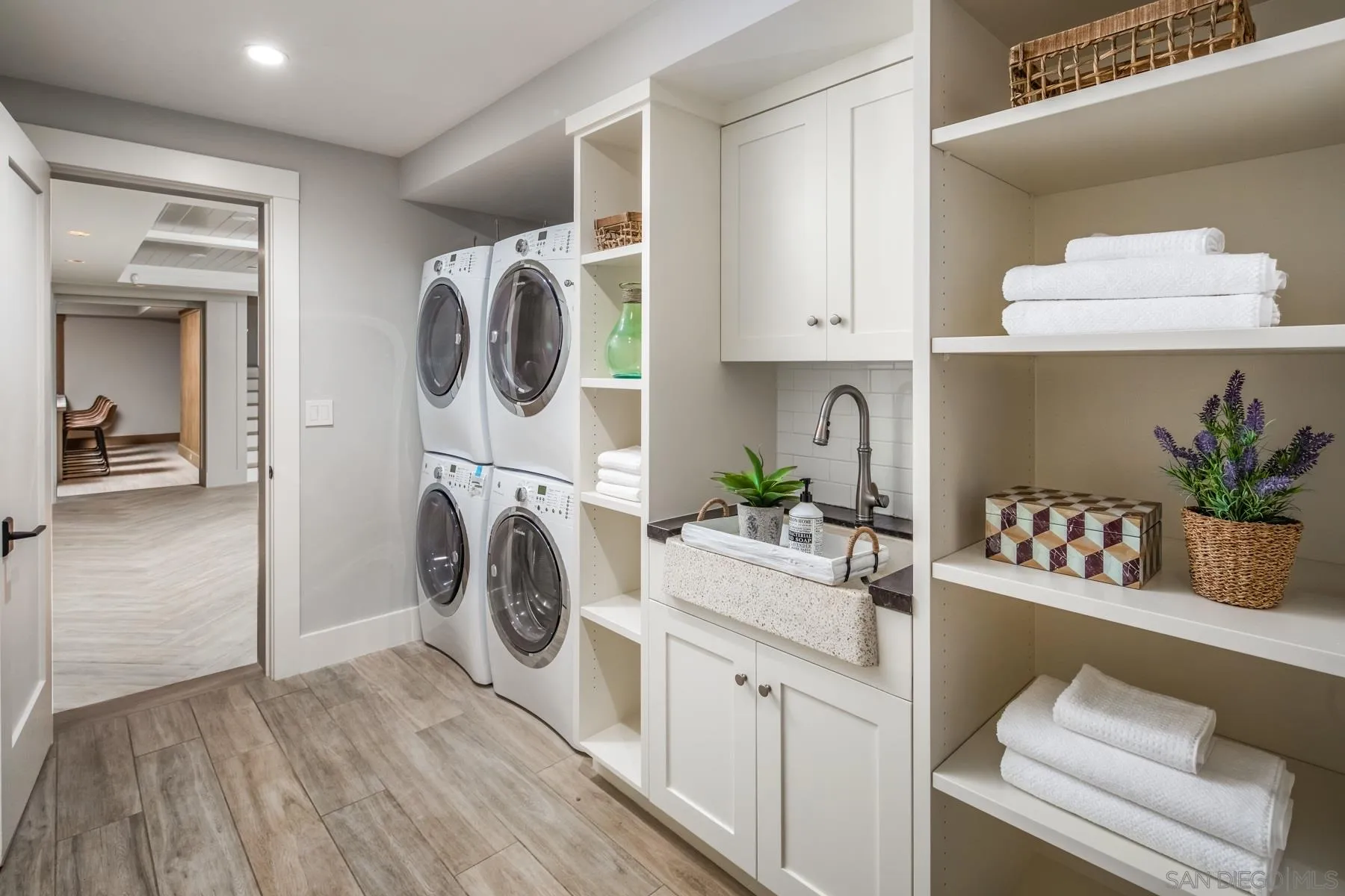 900 Alameda Boulevard Coronado, CA 92118 - Photo 24 of 30 a utility room with sink dryer and washer