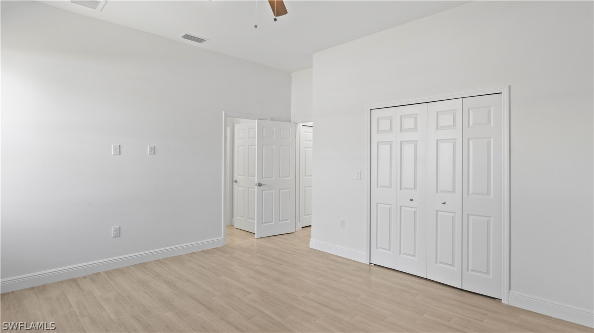 422 Progress Avenue Lehigh Acres, FL 33974 - Photo 15 of 35 a view of an empty room