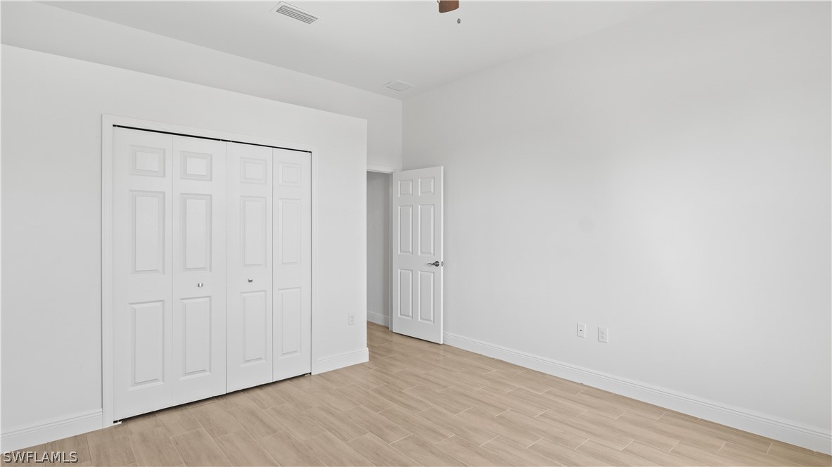 422 Progress Avenue Lehigh Acres, FL 33974 - Photo 26 of 35 a view of an empty room
