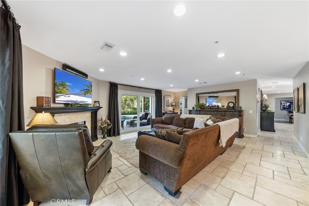 4738 Live Oak Canyon Road La Verne, CA 91750 - Photo 15 of 70 a living room with furniture and a flat screen tv
