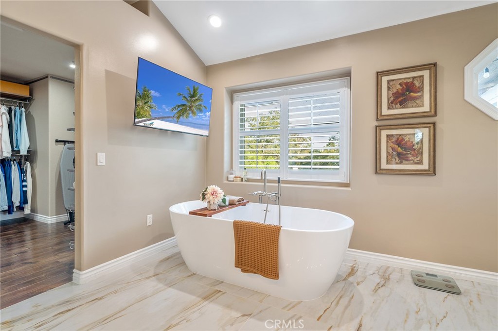 4738 Live Oak Canyon Road La Verne, CA 91750 - Photo 34 of 70 a white bath tub sitting in a bathroom next to a window