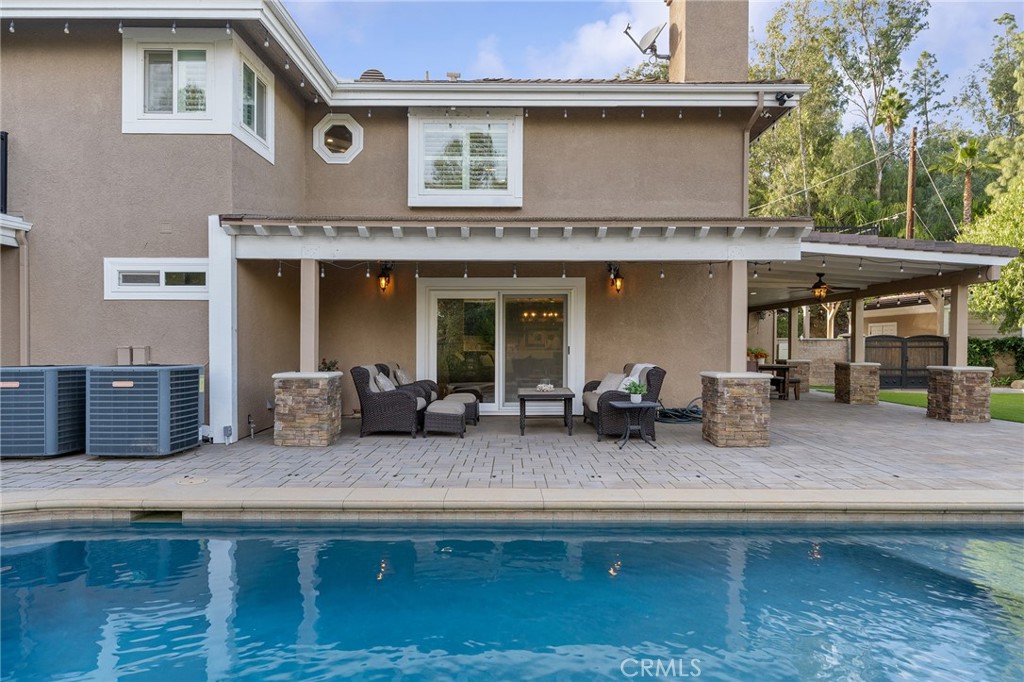 4738 Live Oak Canyon Road La Verne, CA 91750 - Photo 53 of 70 a kitchen with kitchen island a sink and a stove