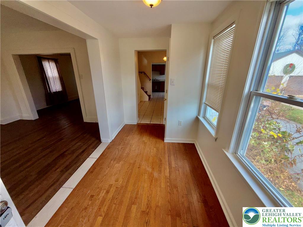 2955 Middletown Road Bethlehem, PA 18020 - Photo 3 of 20 Natural light floods this inviting entryway, showcasing polished hardwood floors.
