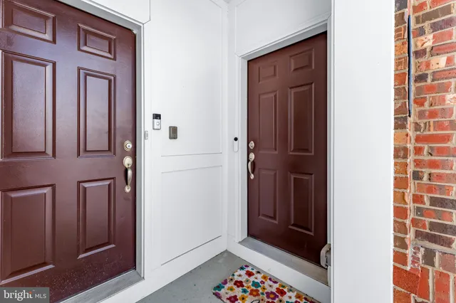 a view of hallway with door