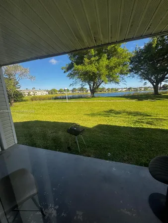 a kitchen with stainless steel appliances and cabinets