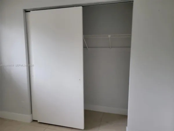 a bathroom with a toilet a sink and bathtub