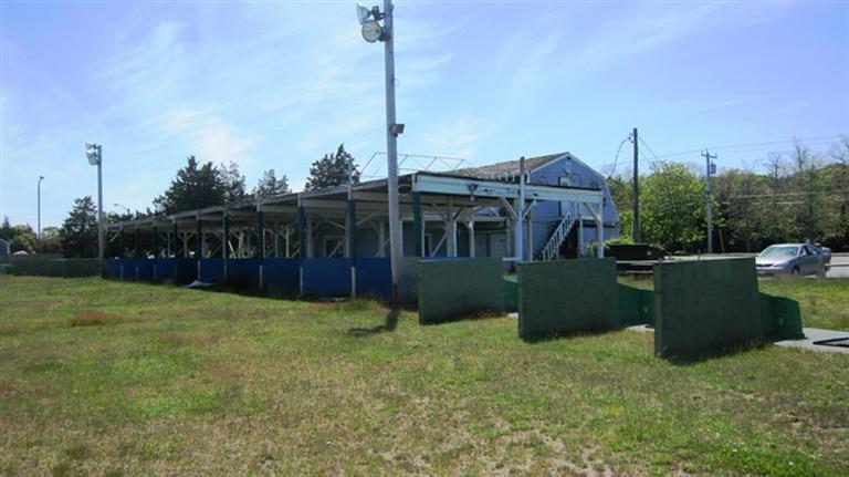 4790 State Highway Eastham, MA 02642 - Photo 7 of 9 a view of a house with a backyard and a park