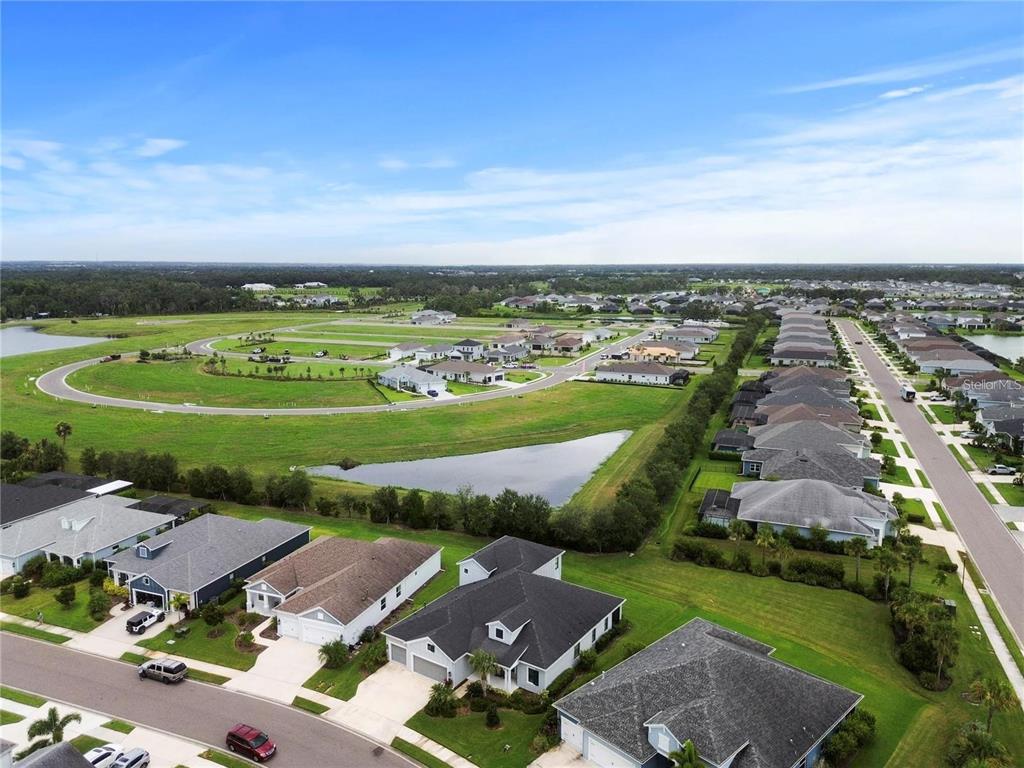 4423 Fly Rod Terrace Parrish, FL 34219 - Photo 2 of 89 an aerial view of a city