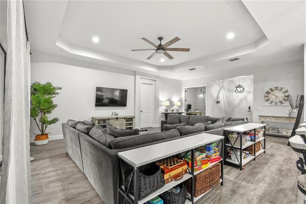 4423 Fly Rod Terrace Parrish, FL 34219 - Photo 23 of 89 a living room with furniture and a flat screen tv