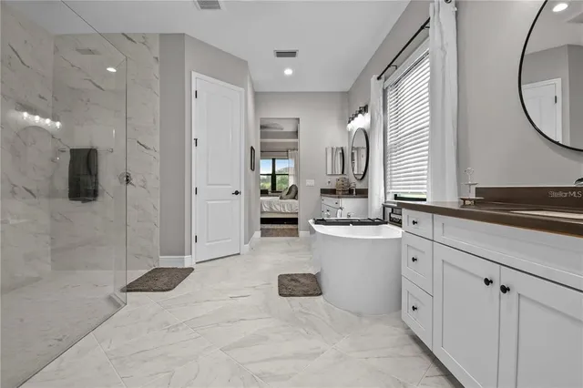 an aerial view of a house with a garden