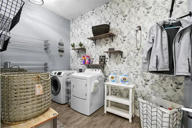 a front view of a house with a garden and plants