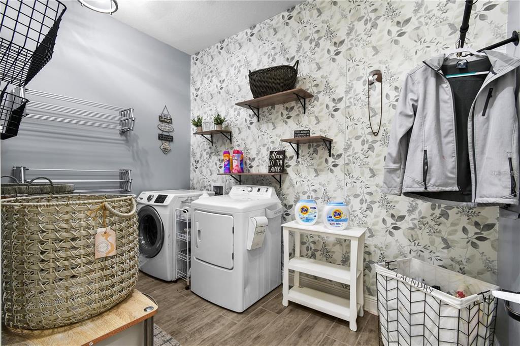 4423 Fly Rod Terrace Parrish, FL 34219 - Photo 38 of 89 a utility room with dryer and washer