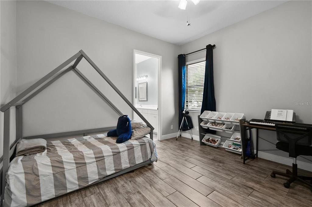 4423 Fly Rod Terrace Parrish, FL 34219 - Photo 41 of 89 a living room with furniture and a wooden floor