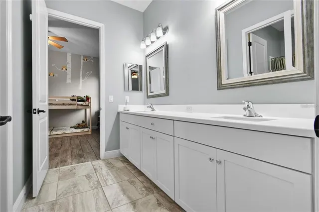 an aerial view of a house with a lake view