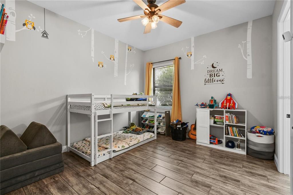 4423 Fly Rod Terrace Parrish, FL 34219 - Photo 47 of 89 a living room with furniture and a wooden floor
