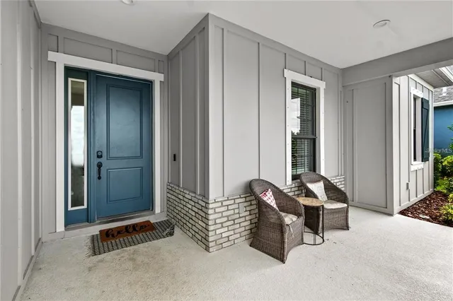 a kitchen with a stove a sink and a refrigerator