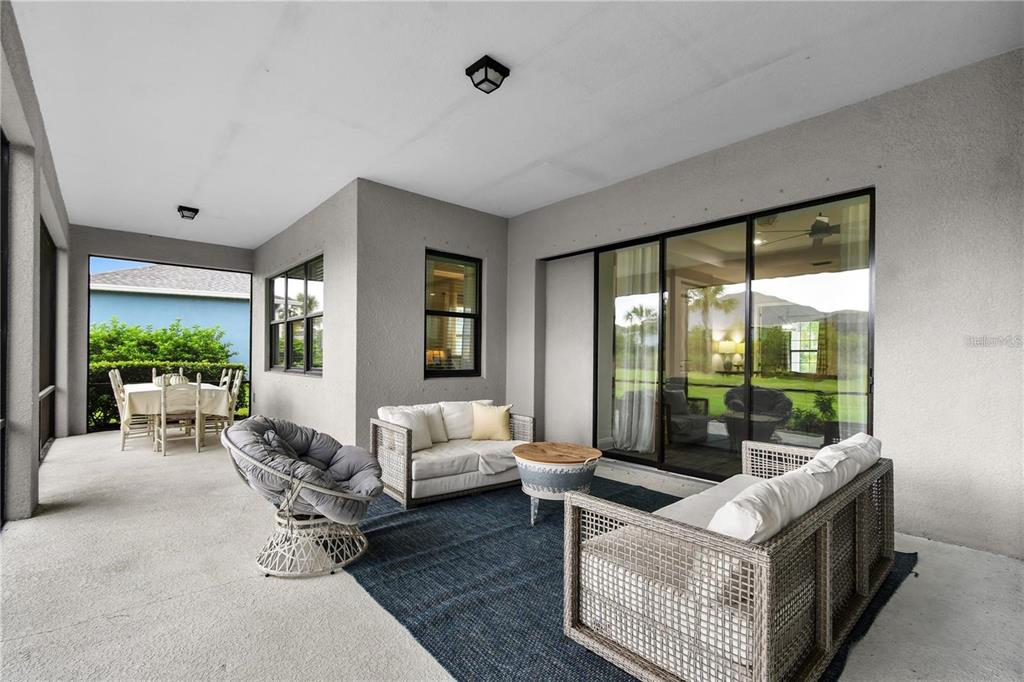 4423 Fly Rod Terrace Parrish, FL 34219 - Photo 52 of 89 a living room with furniture and a large window