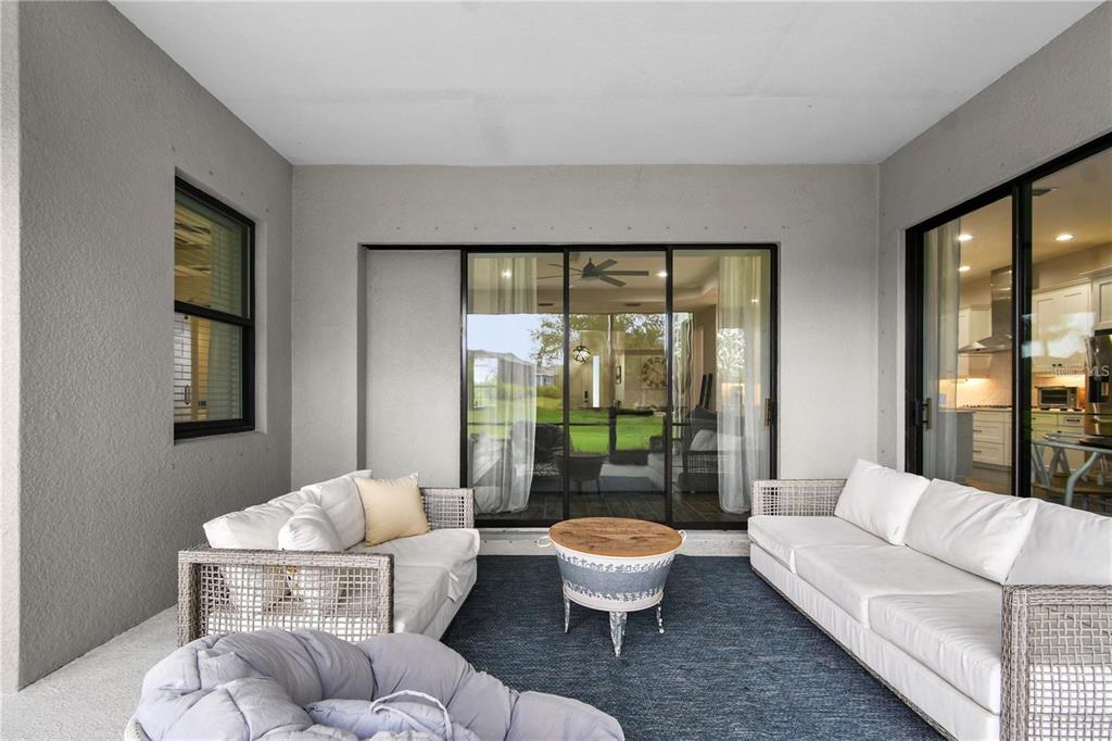 4423 Fly Rod Terrace Parrish, FL 34219 - Photo 53 of 89 a living room with furniture and a potted plant