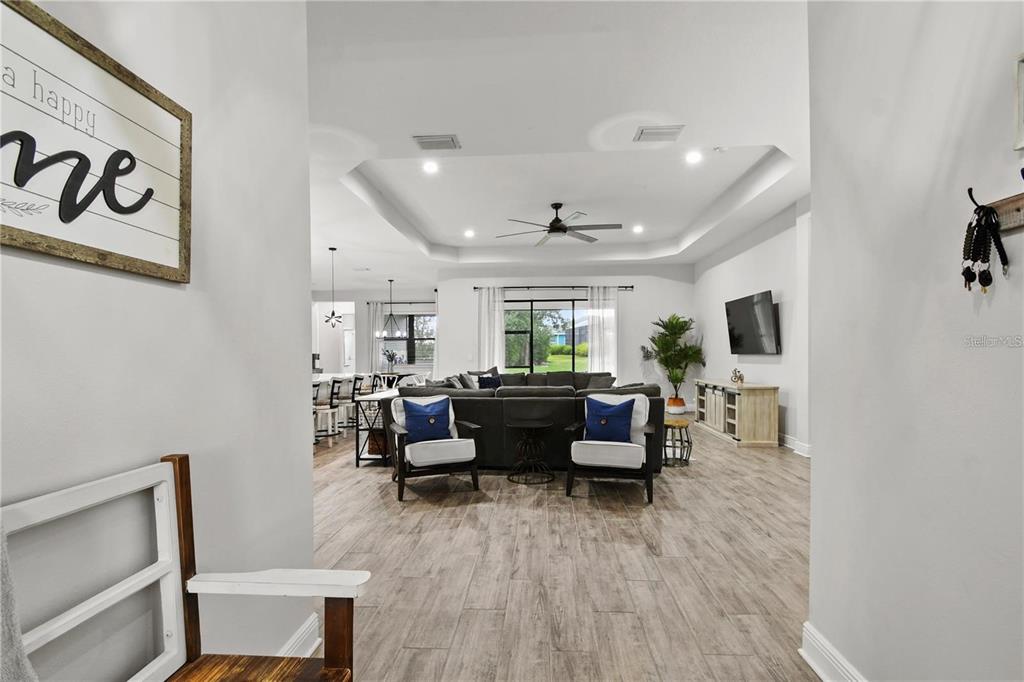 4423 Fly Rod Terrace Parrish, FL 34219 - Photo 6 of 89 a living room with furniture and a flat screen tv