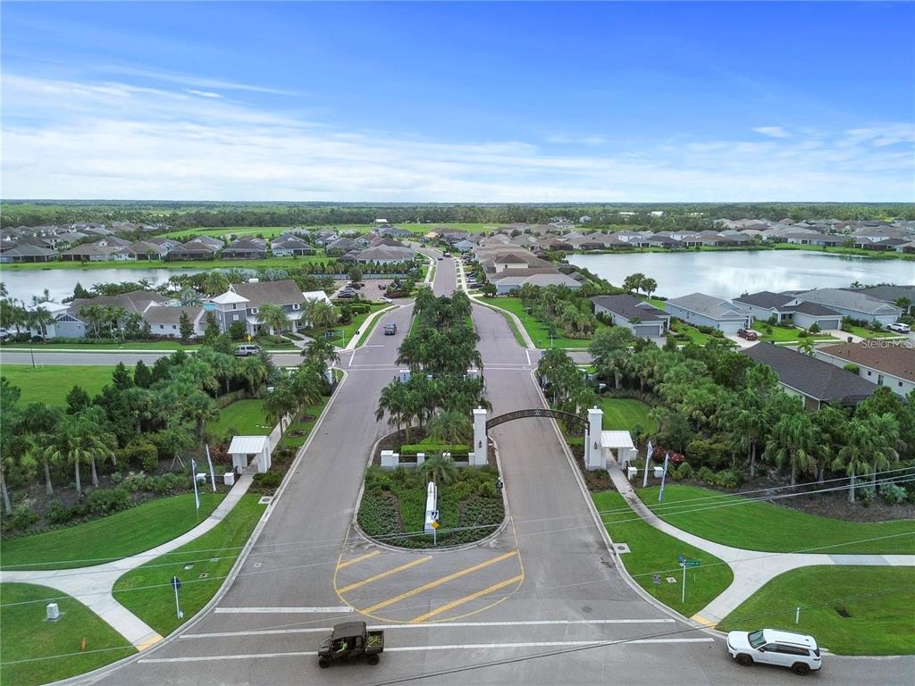 4423 Fly Rod Terrace Parrish, FL 34219 - Photo 73 of 89 an aerial view of a house with outdoor space lake view and mountain view in back
