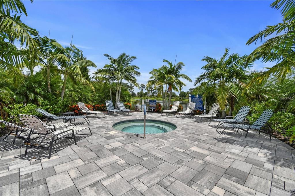 4423 Fly Rod Terrace Parrish, FL 34219 - Photo 83 of 89 a view of swimming pool with outdoor seating and plants