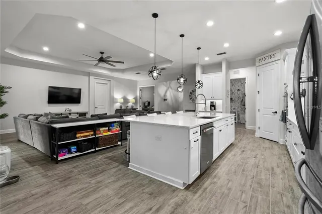 a living room with furniture and a rug