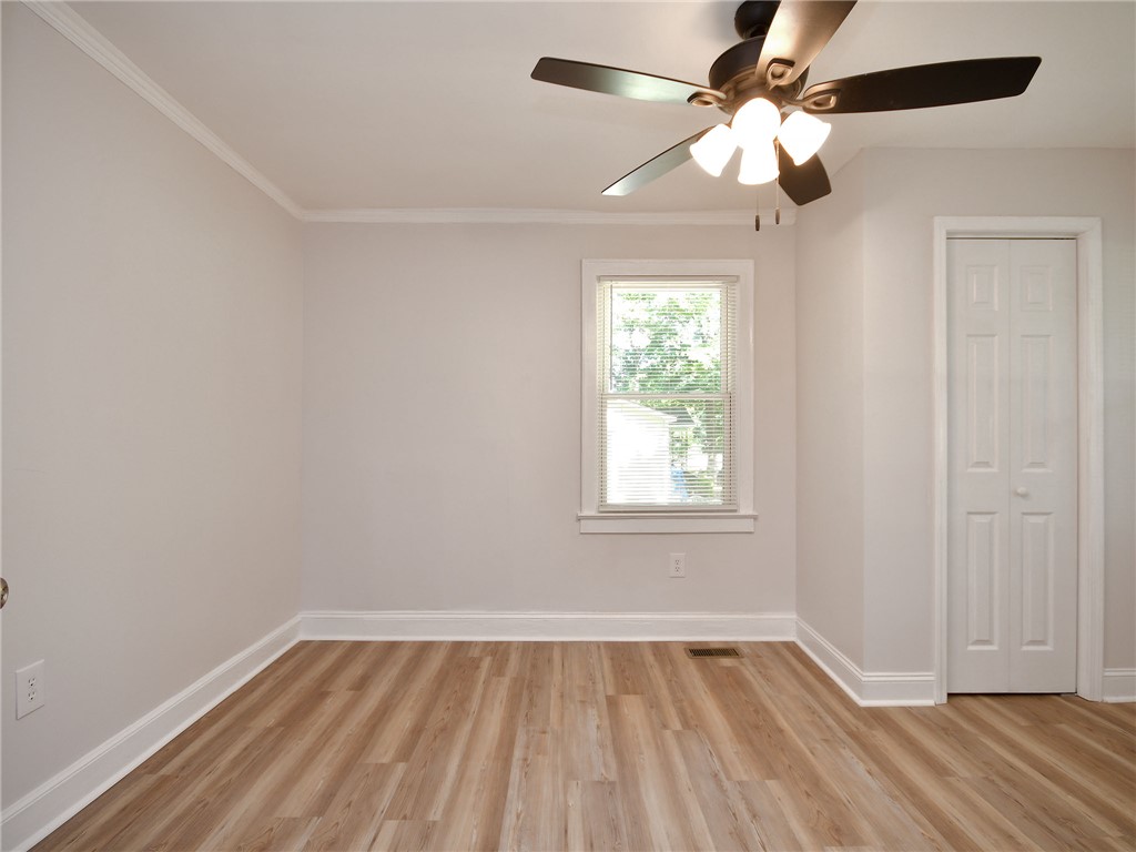 3517 Shawnee Avenue Anderson, SC 29626 - Photo 23 of 25 Laminate flooring and crisp white trim create an inviting, easy-to-maintain space.