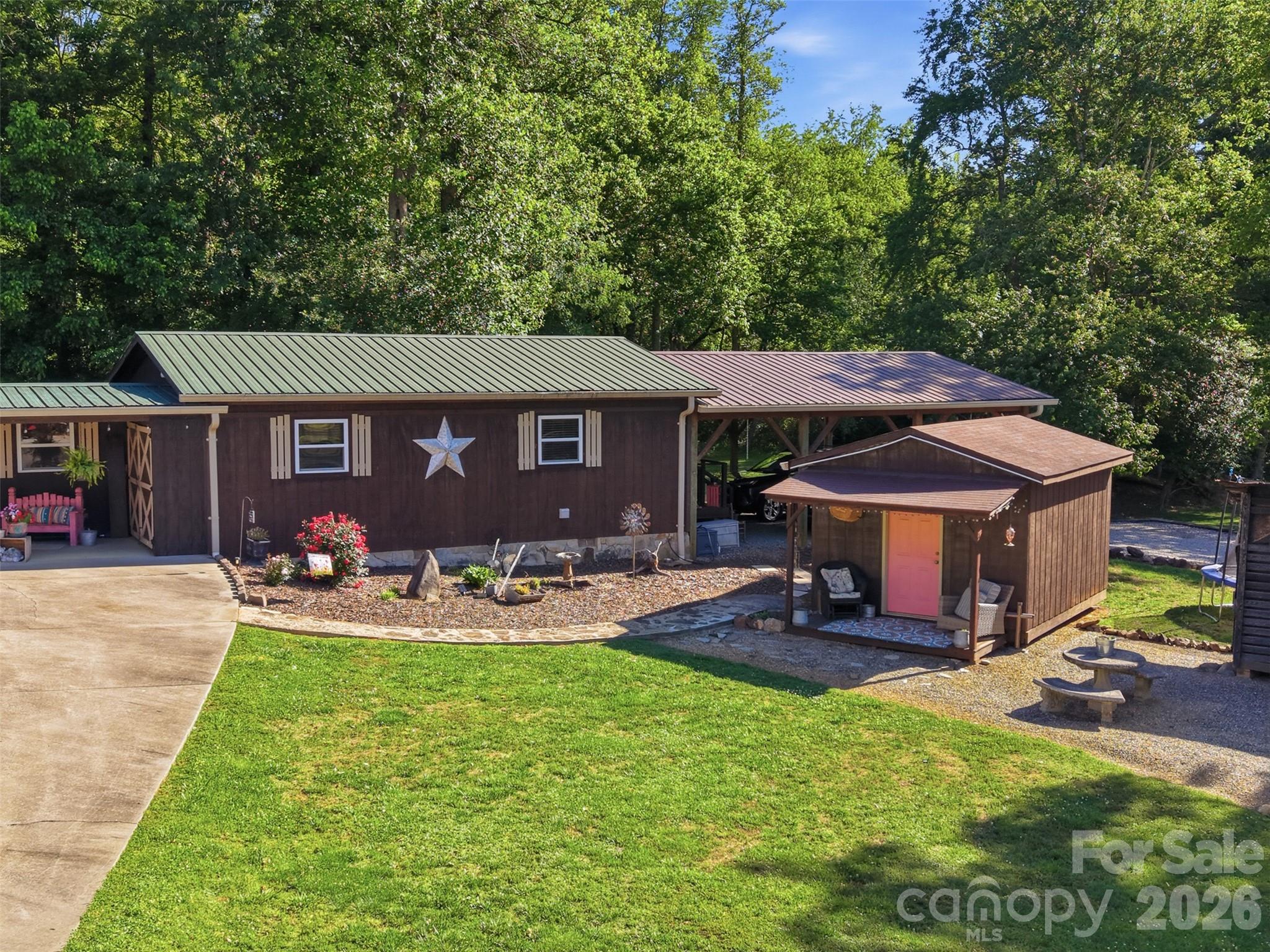 176-174 Oak Hollow Road Union Grove, NC 28689 - Photo 48 of 48 a view of a house with backyard porch and sitting area