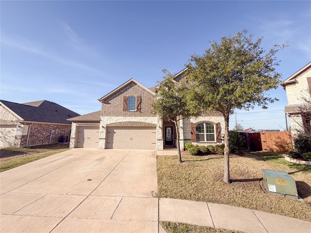 328 Callaghan Drive Fate, TX 75189 - Photo 2 of 37 a view of a white house with a large tree in front of it