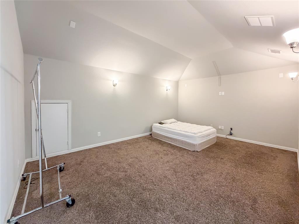 328 Callaghan Drive Fate, TX 75189 - Photo 27 of 37 a view of a room with gym equipment