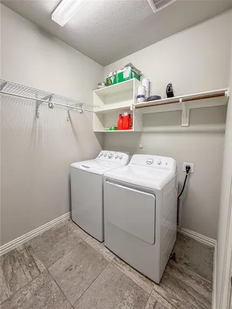 a very nice looking room with a window and a ceiling fan
