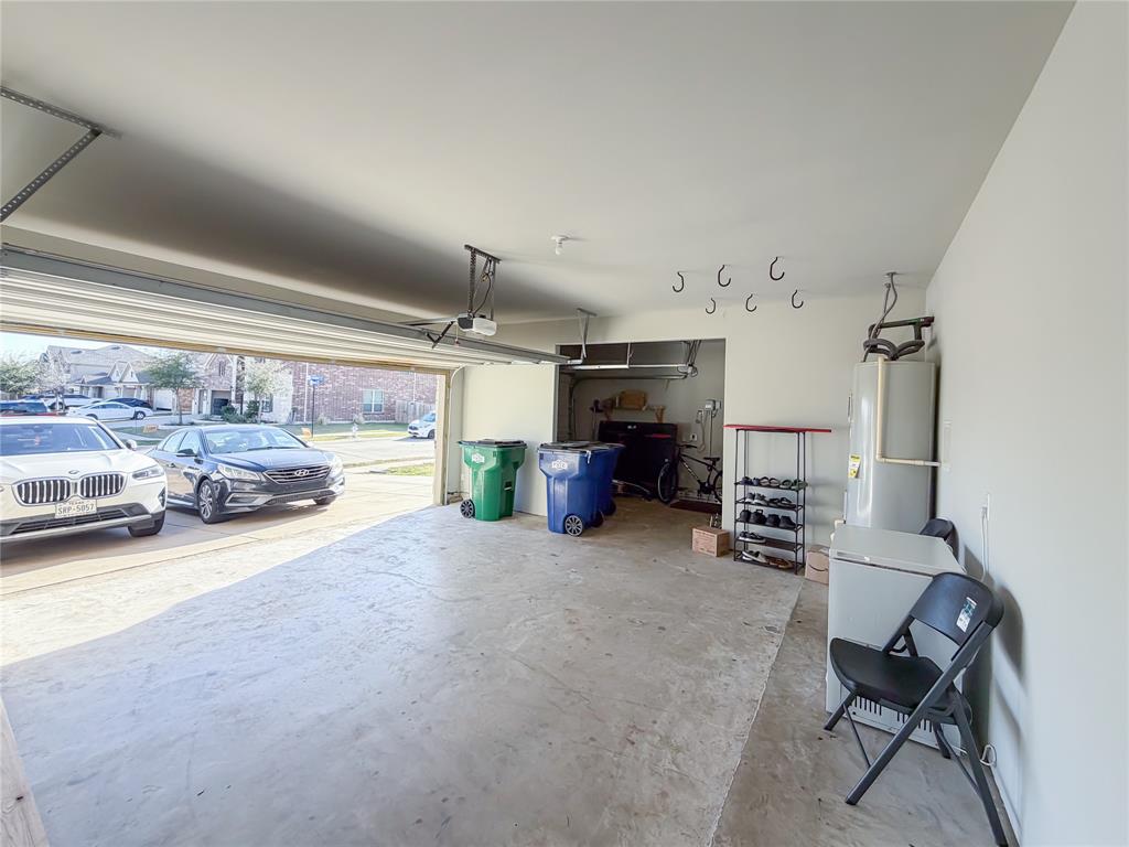 328 Callaghan Drive Fate, TX 75189 - Photo 32 of 37 a view of a livingroom with furniture and a window
