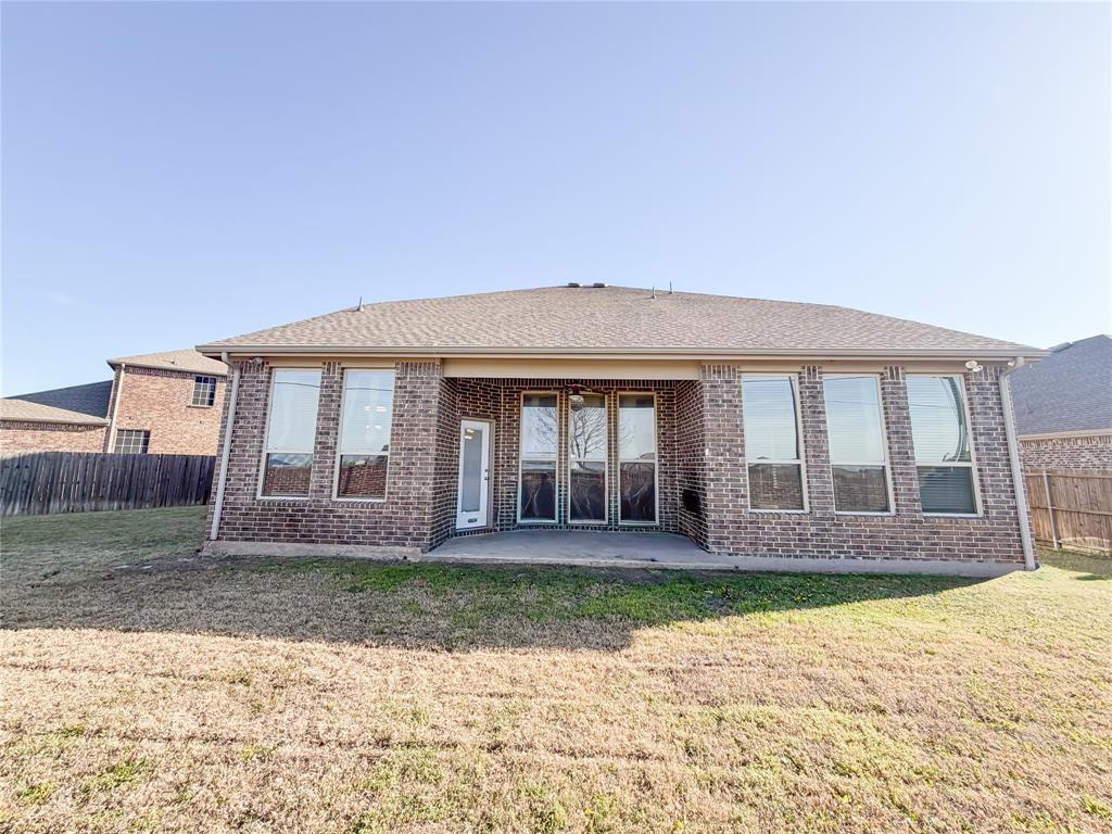 328 Callaghan Drive Fate, TX 75189 - Photo 35 of 37 a front view of a house with a yard