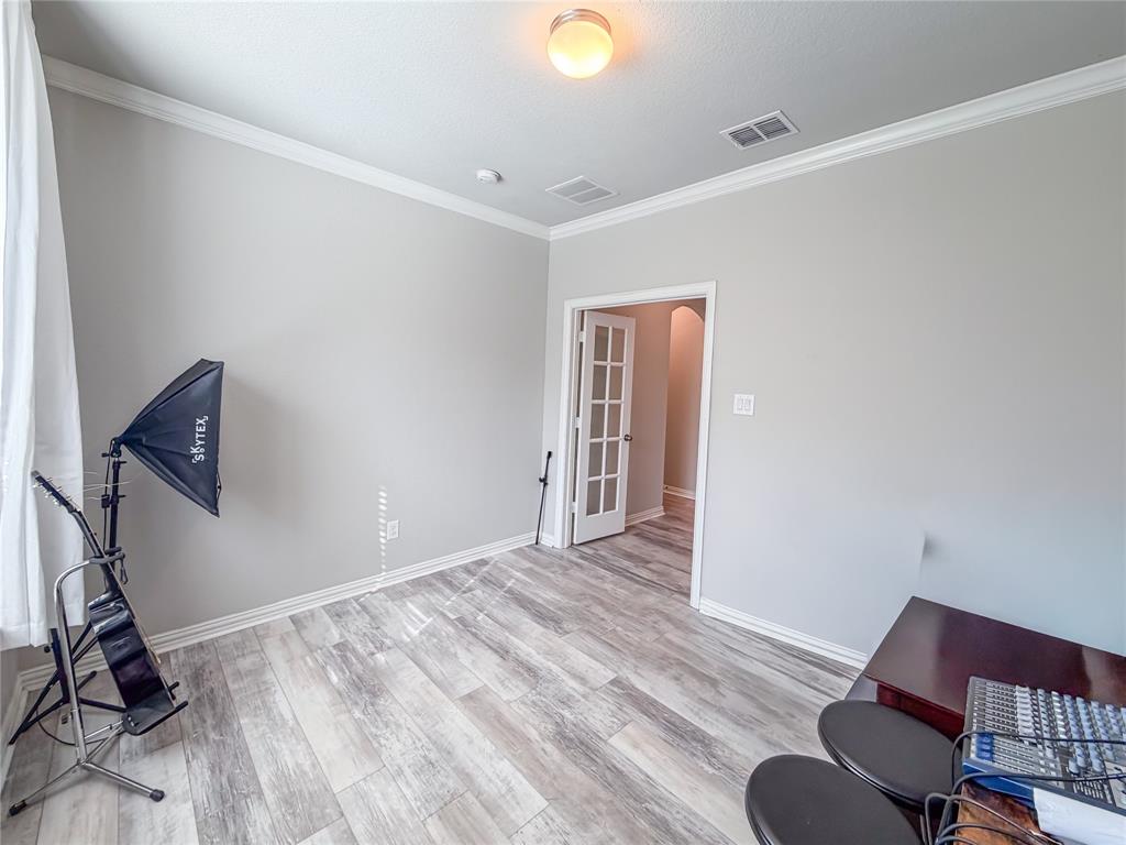 328 Callaghan Drive Fate, TX 75189 - Photo 4 of 37 a view of room with workspace