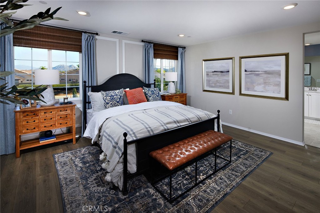 31099 Scrub Jay Road Winchester, CA 92596 - Photo 7 of 9 a bed sitting in a bedroom next to a window