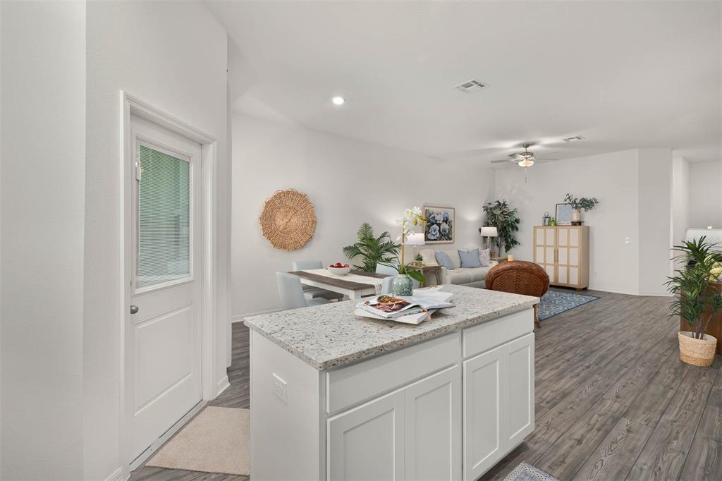 721 Poppy Lane Dundee, FL 33838 - Photo 11 of 26 a very nice looking dining room with a table and chairs