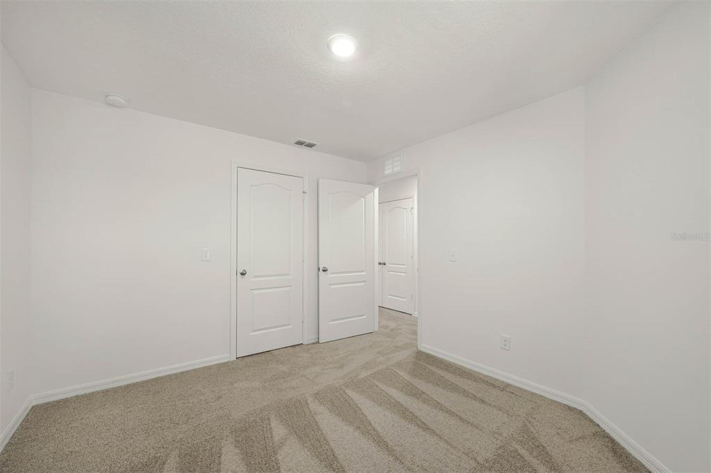 721 Poppy Lane Dundee, FL 33838 - Photo 19 of 26 a view of an empty room