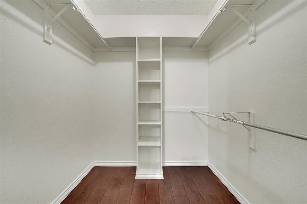 9254 Forest Lane, Unit 407 Dallas, TX 75243 - Photo 14 of 15 a view of an empty walk in closet
